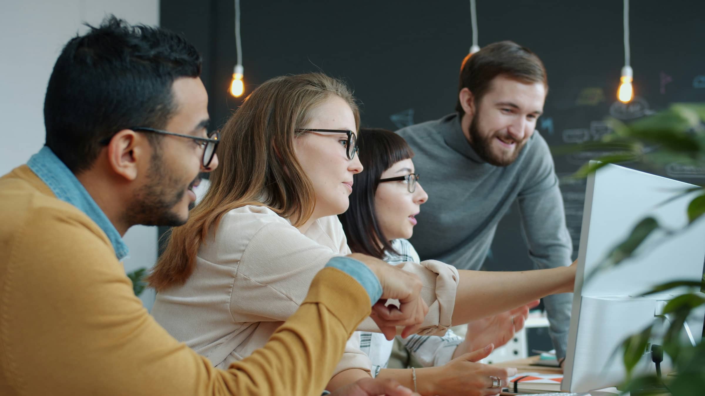 Team working together at a computer